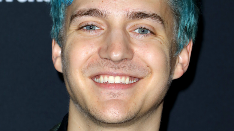 Ninja smiling on red carpet