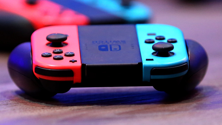 Joy-Con controllers on plastic hub