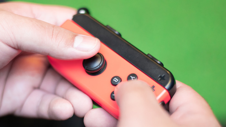 Person holding Joycon