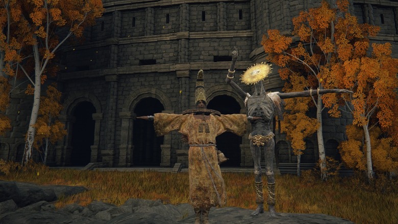 Player posing with Elden Ring's Goldmask