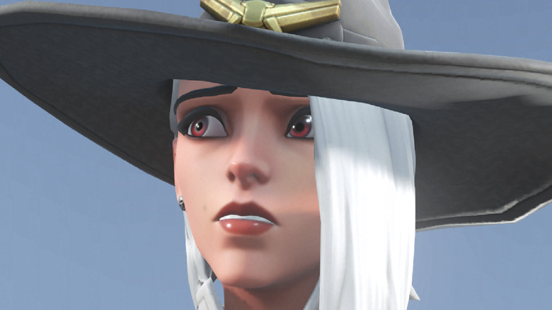 Ashe looks worried to the side, as if thinking about how pricey Overwatch 2 skins are