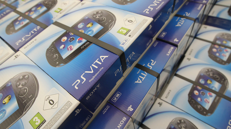 A stack of boxed PS Vita systems