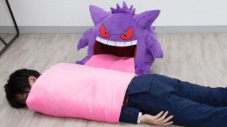 Man rolled in the gengar cushion's tongue