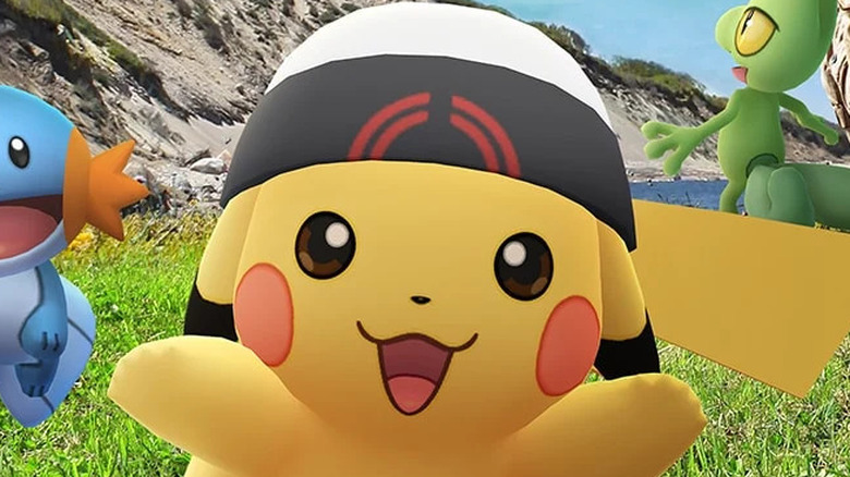 Pikachu in hat looking really happy