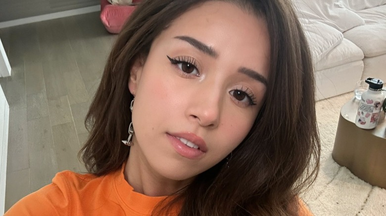 Pokimane orange shirt selfie