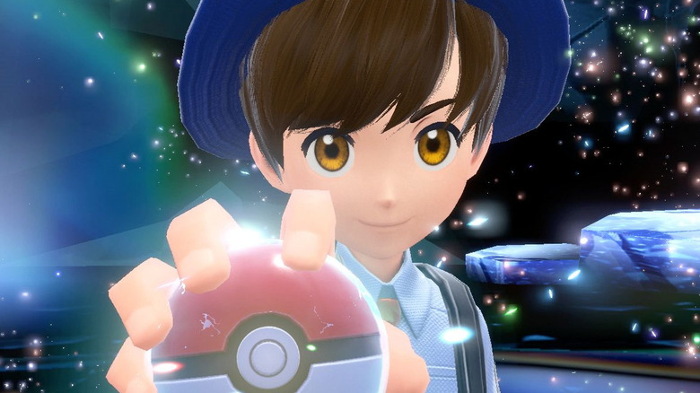 Pokemon trainer holding Pokeball