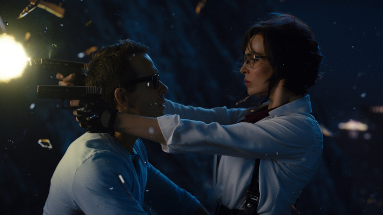 Ryan Reynolds and Jodie Comer on a motorcycle in Free Guy