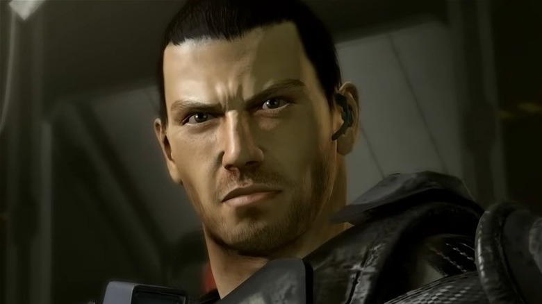 Dan Marshall, the lead character of Binary Domain, standing with his gun at the ready