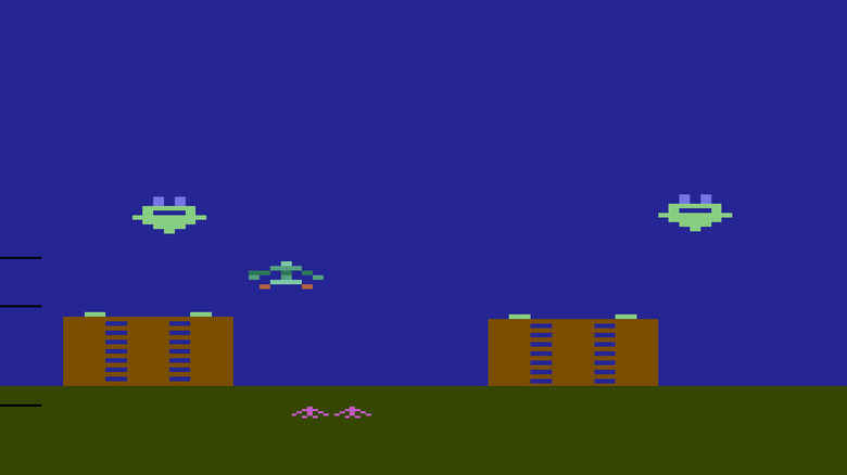 A spaceship moves to intercept bombs descending on two buildings in "Air Raid" (1982)