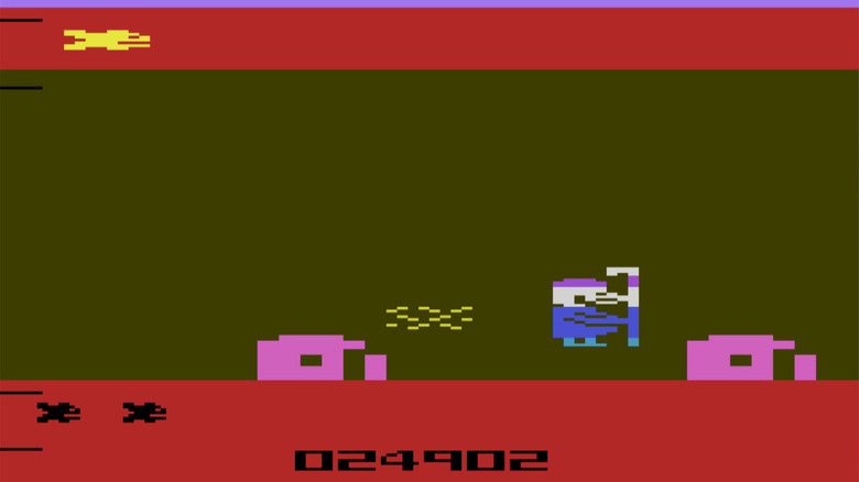 Moses avoids two large fish as he walks between the Red Sea in "Red Sea Crossing" (1983)