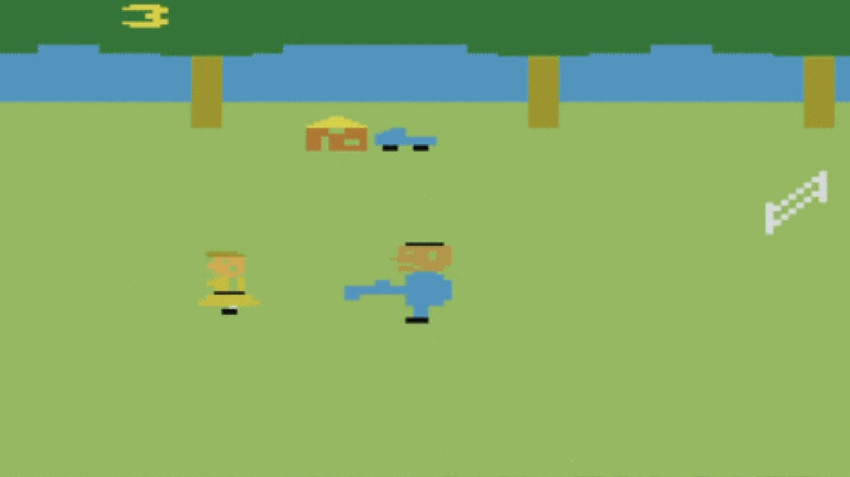 Leatherface pursues a woman in an open yard in "The Texas Chainsaw Massacre" (1983)