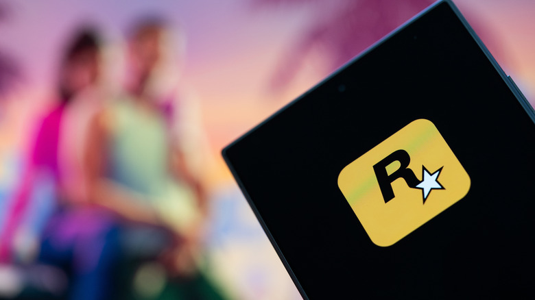 A Rockstar Games notebook with a blurred image of "GTA6" in the background