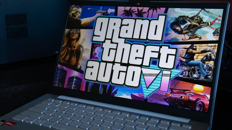 A laptop showing mock-up art for "GTA6"