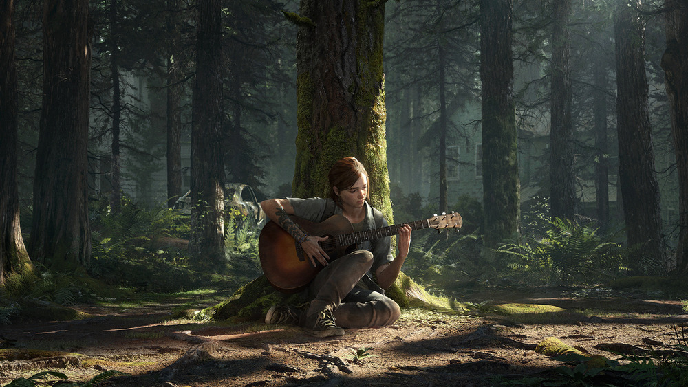 Elle playing acoustic guitar