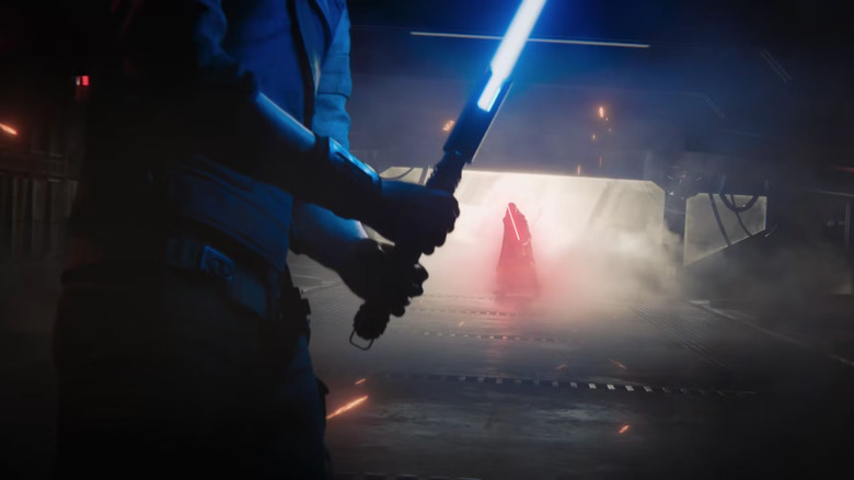 Cal with a drawn lightsaber as Dark Jedi approaches