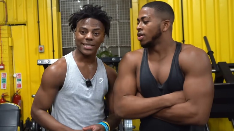 IShowSpeed standing next to trainer