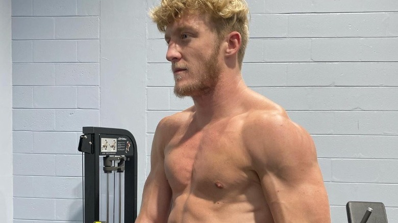 Tfue posing in the gym