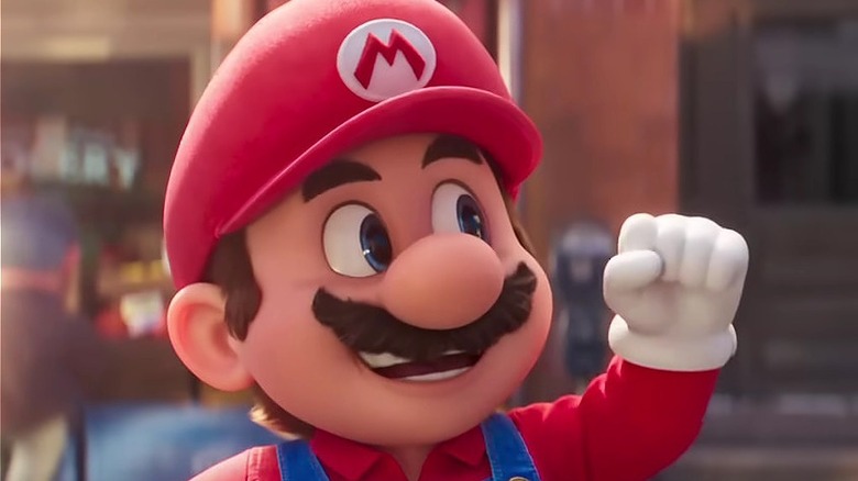 Mario fist bumping Luigi