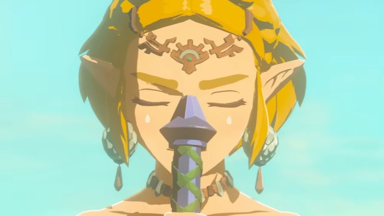 Zelda holding Master Sword