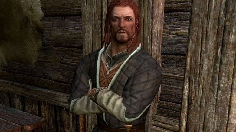 Brynjolf leaning against a wall