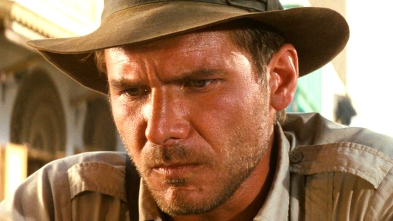 Indiana Jones looking down