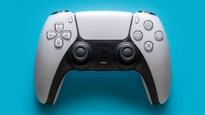 DualSense controller on blue background