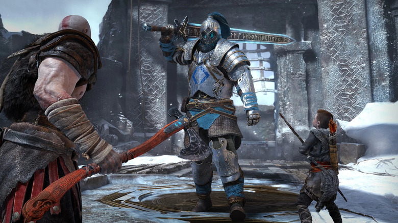 Kratos and Atreus facing an Einherjar