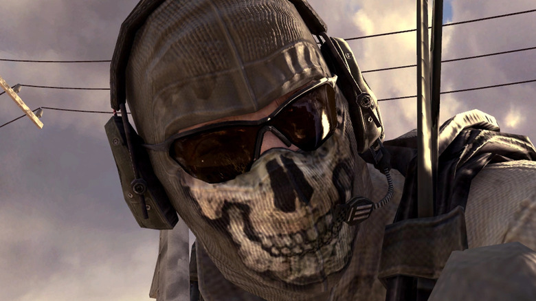 Operator wearing skull mask and headset