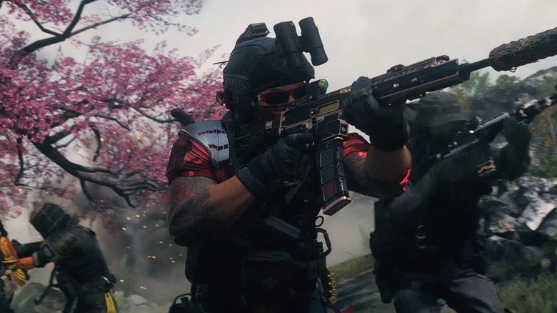 Soldiers fighting under flowering tree