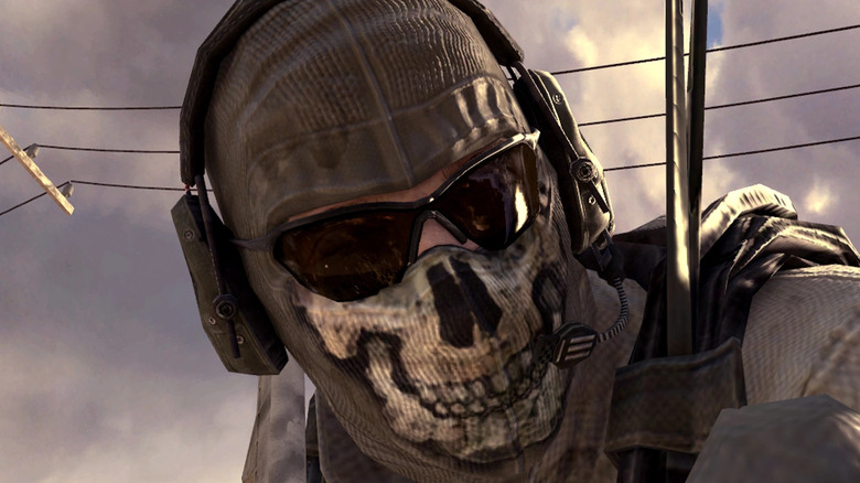 Operator wearing skull mask and headset