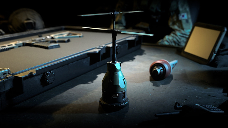 Snapshot grenade and other equipment on table