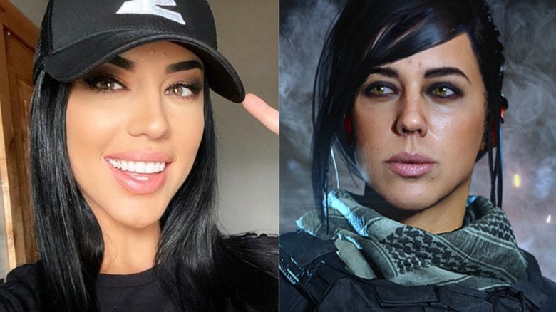 Alex Zedra making a peace sign