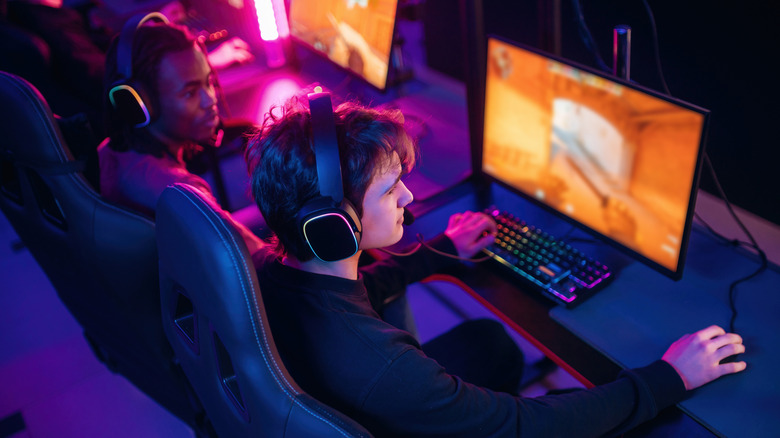 Two teammates on an esports team