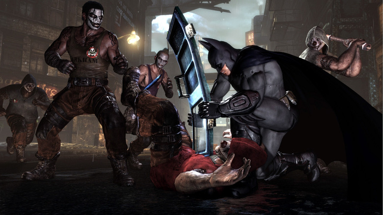Batman fighting Arkham thugs