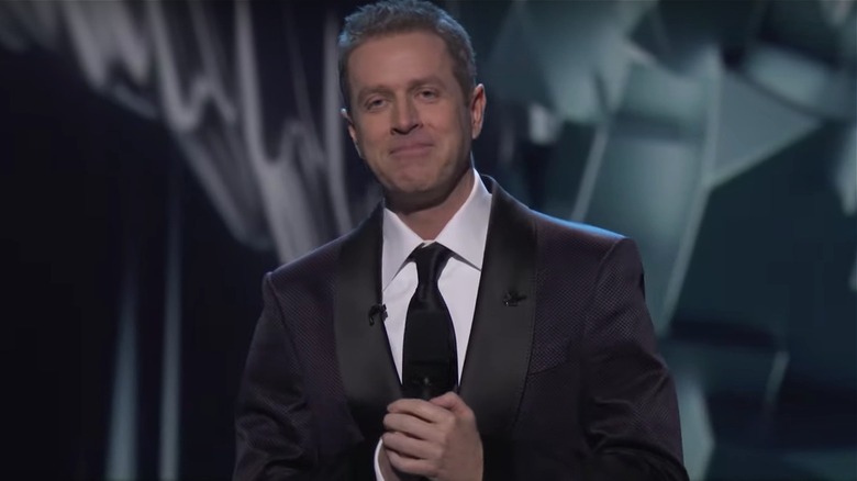 Geoff Keighley wearing a suit