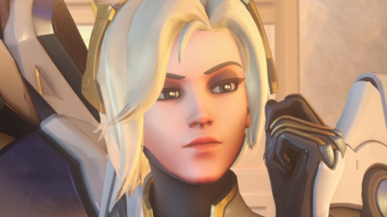 Mercy next to Winston in Overwatch 2