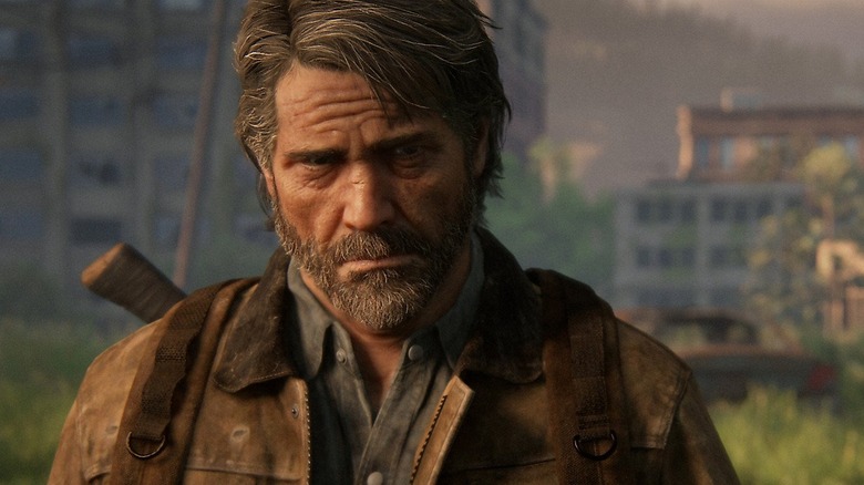 Joel looking at Ellie just off camera in The Last of Us Part II (2020)