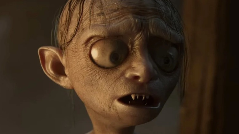 Gollum looks down 