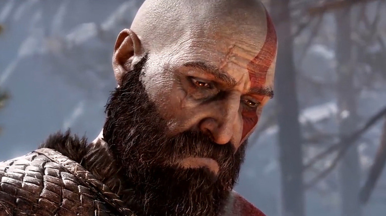 Kratos looks down sadly