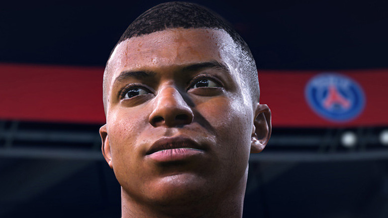 Kylian Mbappé with aspiring look