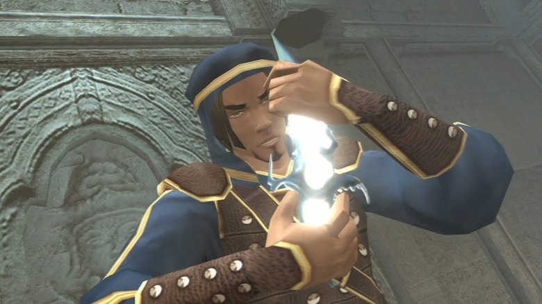 A man holds a glowing dagger