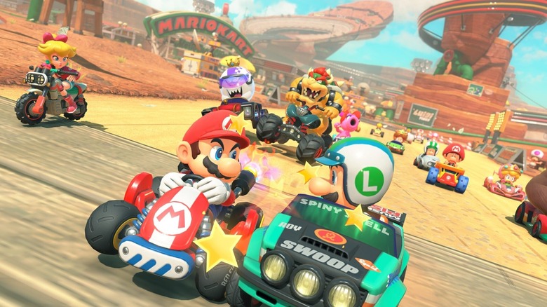 Mario and Luigi's go-karts bang against each other in Mario Kart World