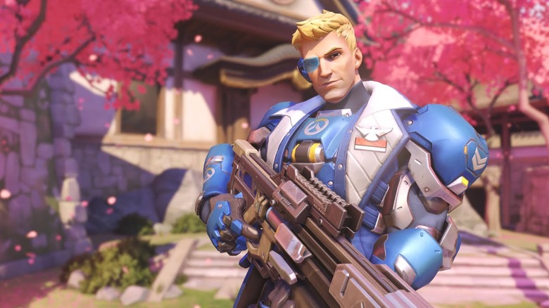 Strike Commander Morrison holding a gun