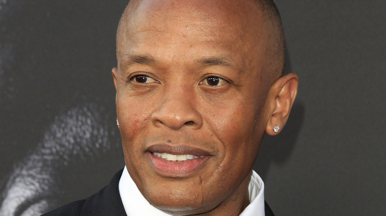 Dr. Dre smiling at red carpet event