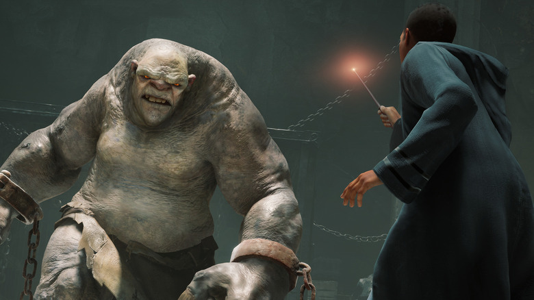 Wizard boy pointed wand at troll