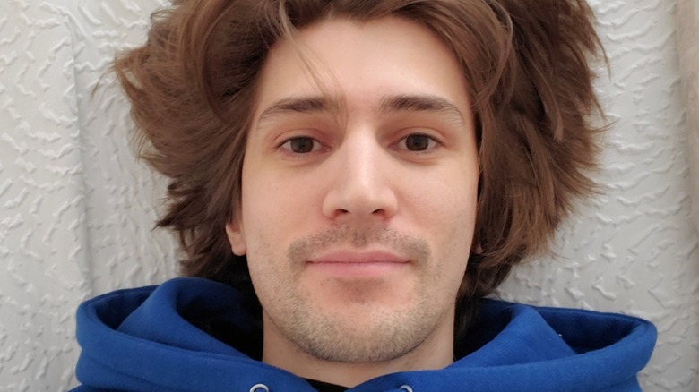 xQc selfie lying down