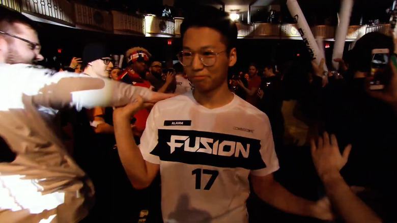 Alarm with crowd of fans