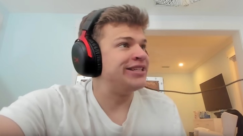 Jynxzi wearing headphones