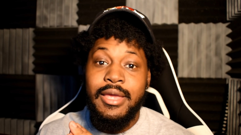 CoryxKenshin wearing black hat