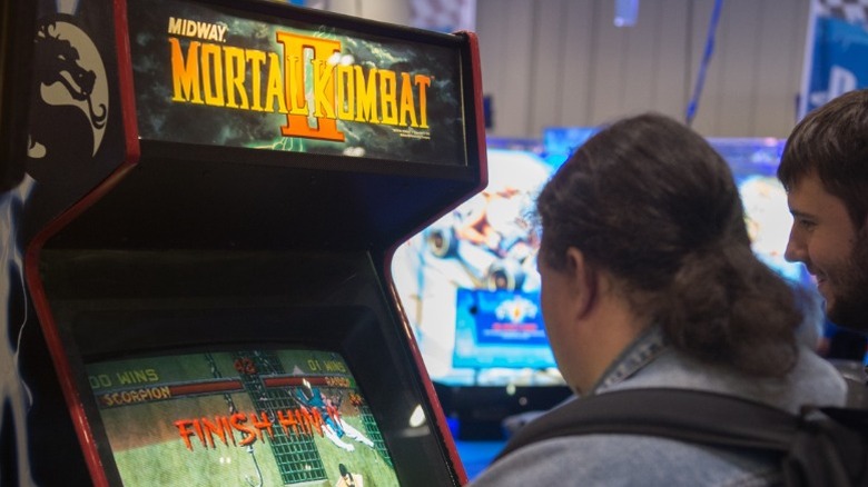 Adults playing MK2